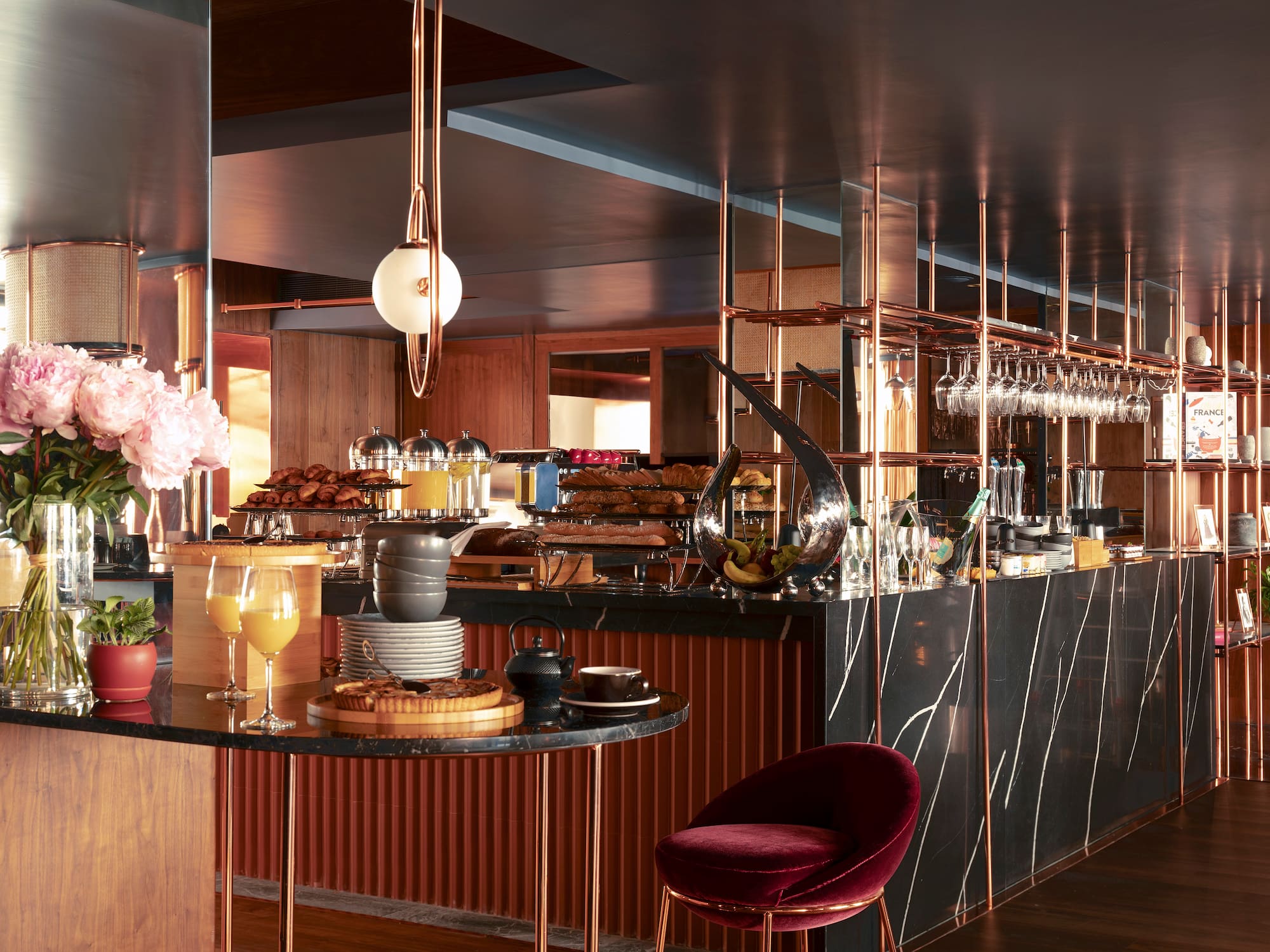 a bar with a counter and a chair