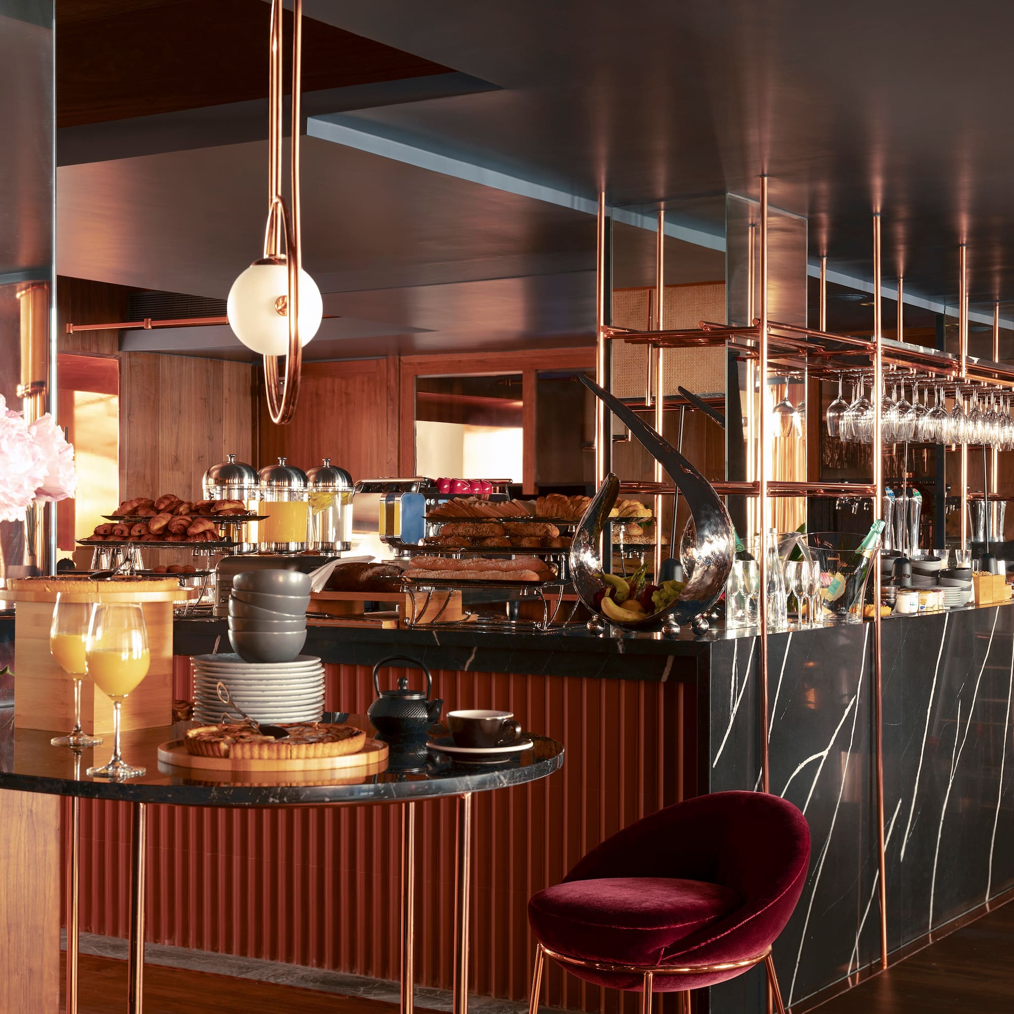 a bar with a counter and a chair