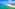 a beach with buildings and a body of water