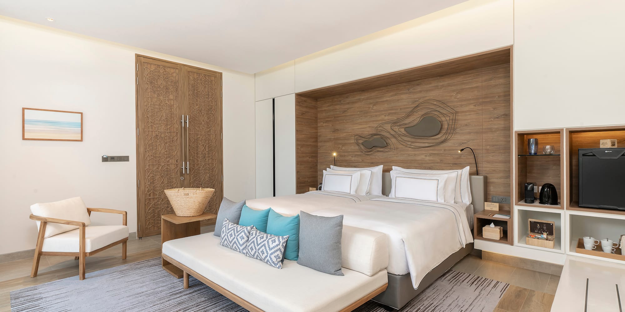 a bedroom with a bed and a fan