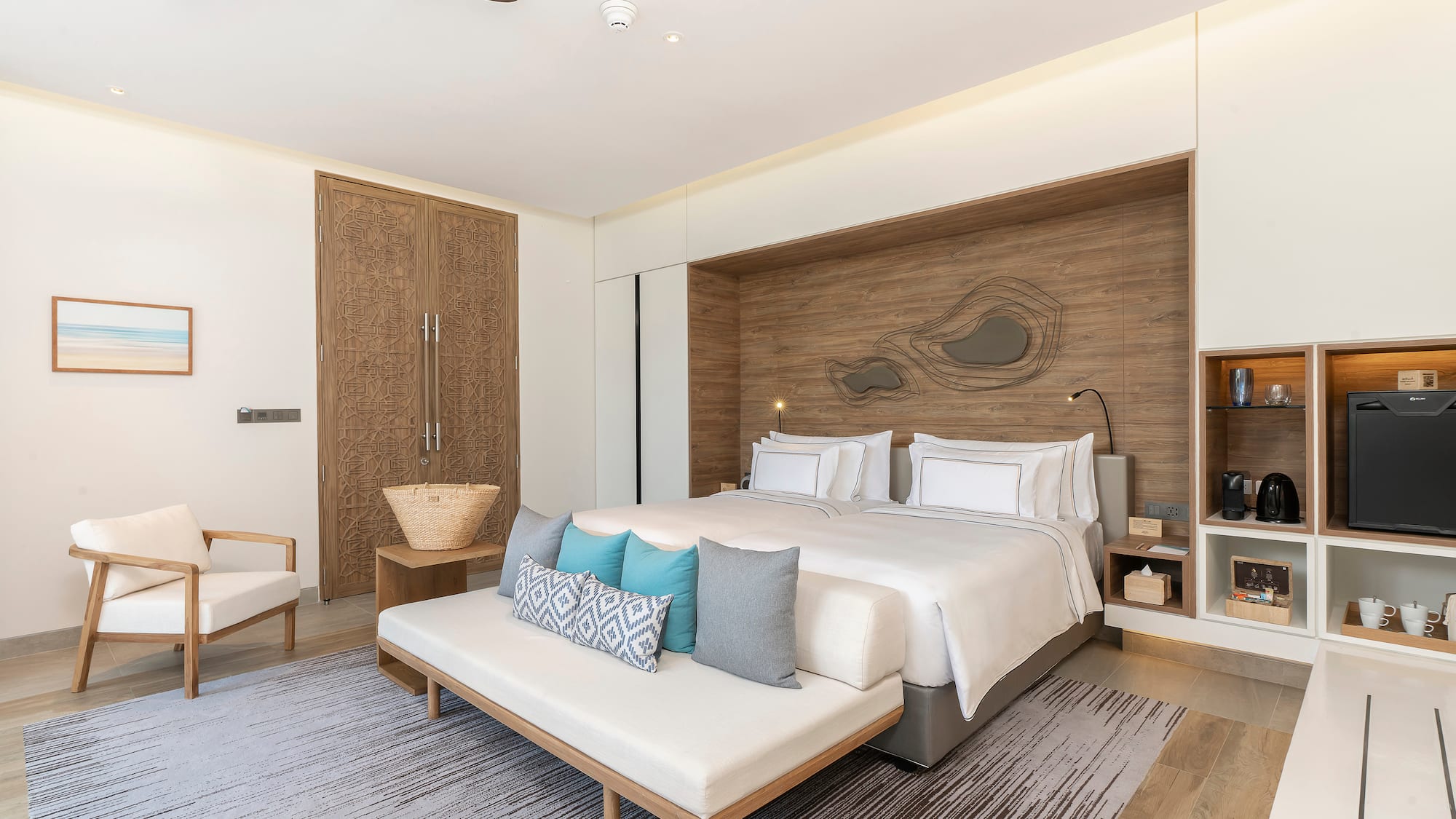 a bedroom with a bed and a fan