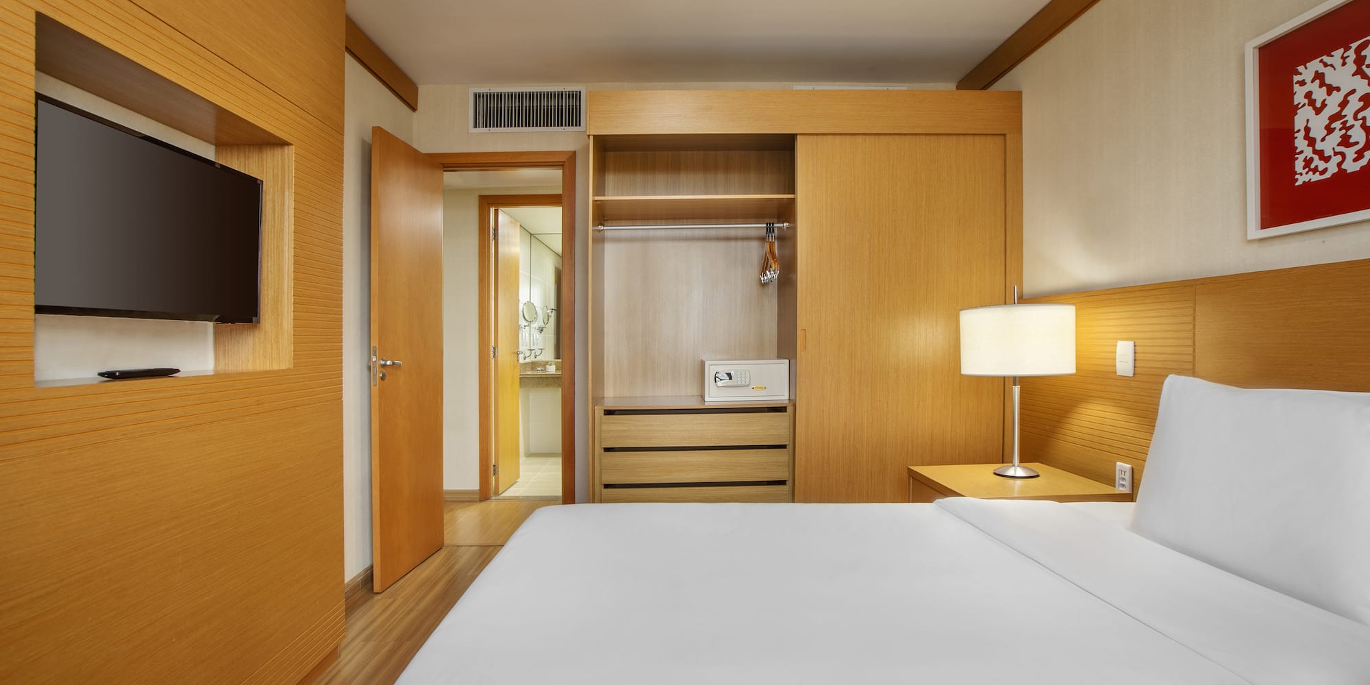 a room with a bed and a closet