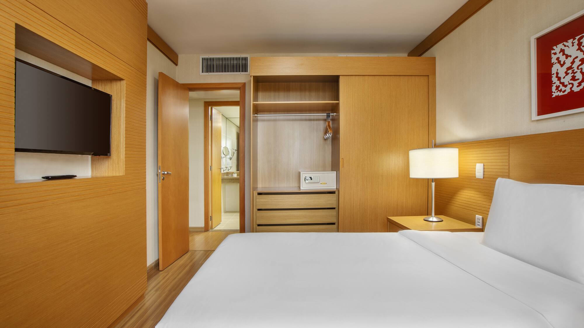 a room with a bed and a closet