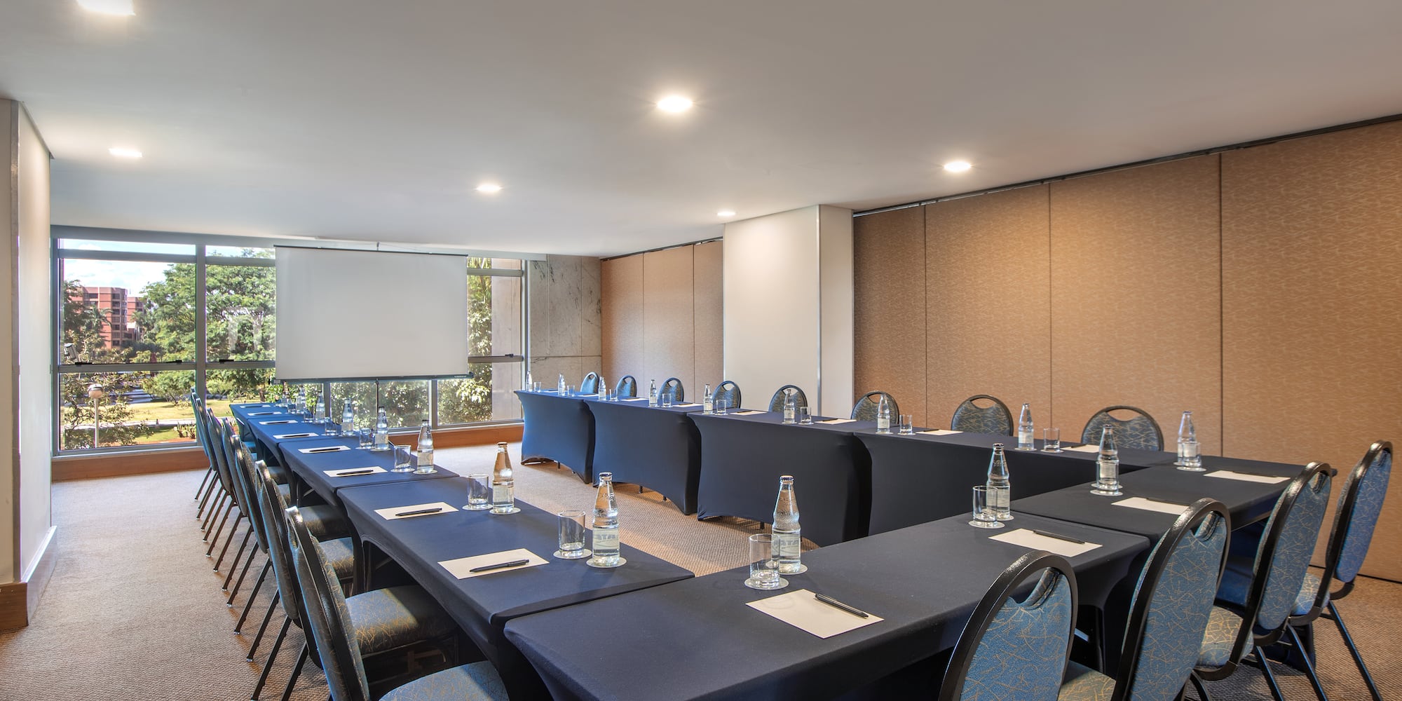 a room with tables and chairs