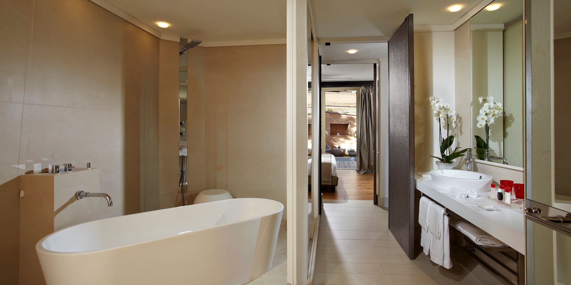 a bathroom with a tub and sink