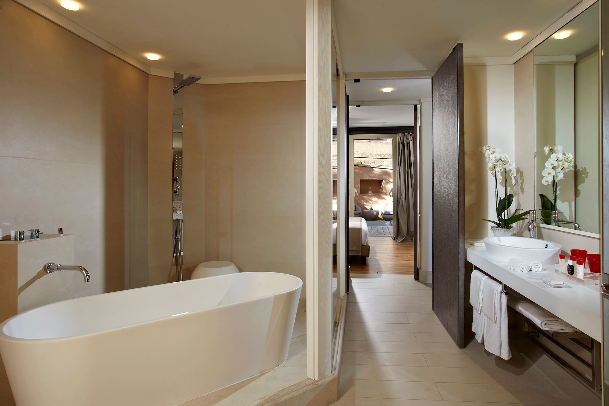 a bathroom with a tub and sink