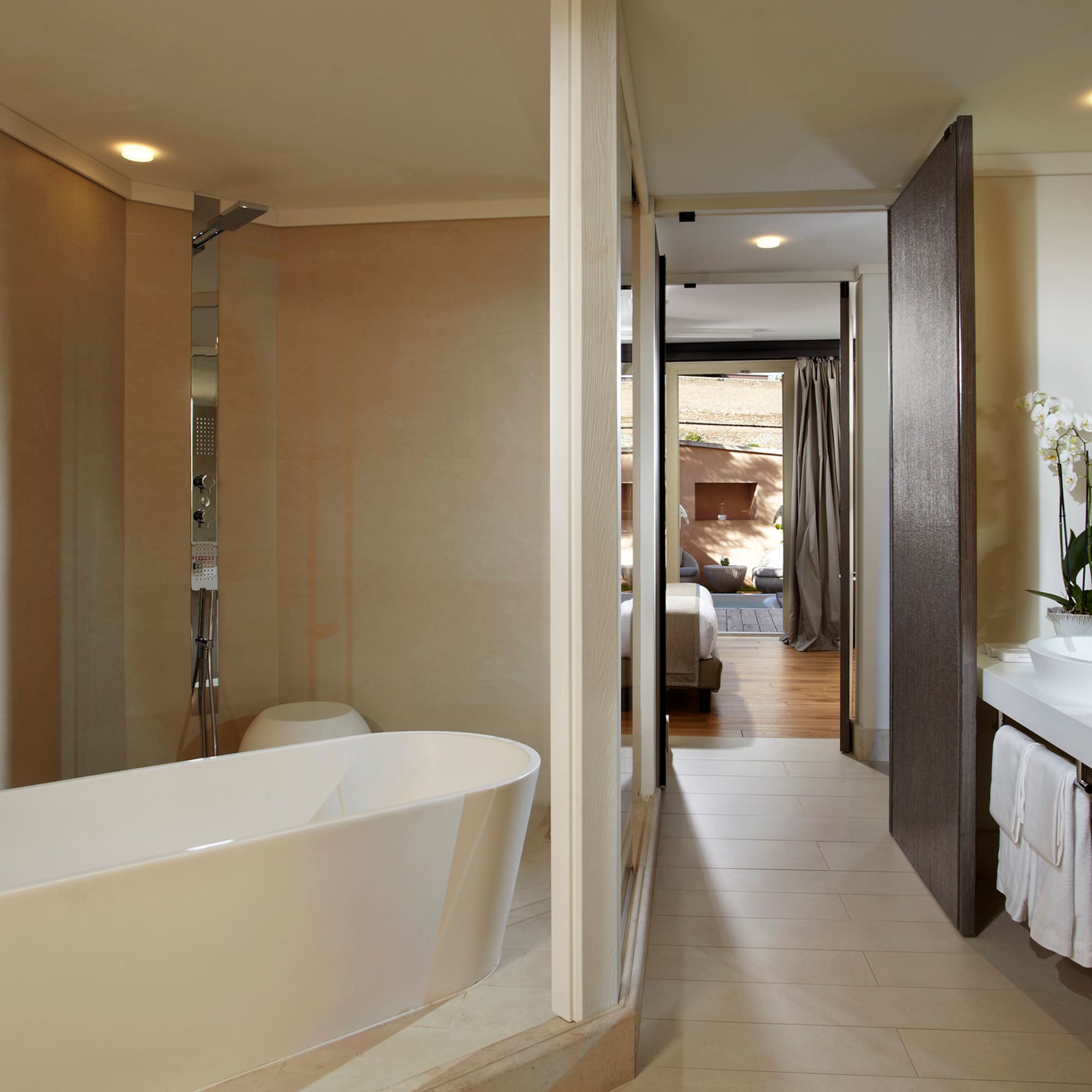 a bathroom with a tub and sink