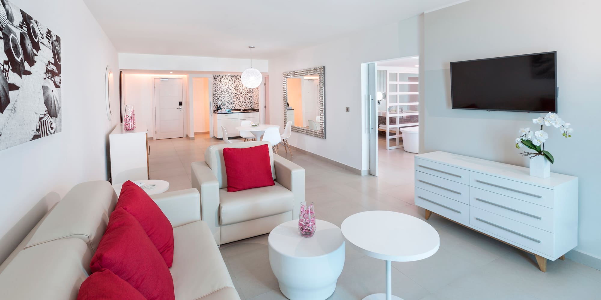 a living room with a television and a couch