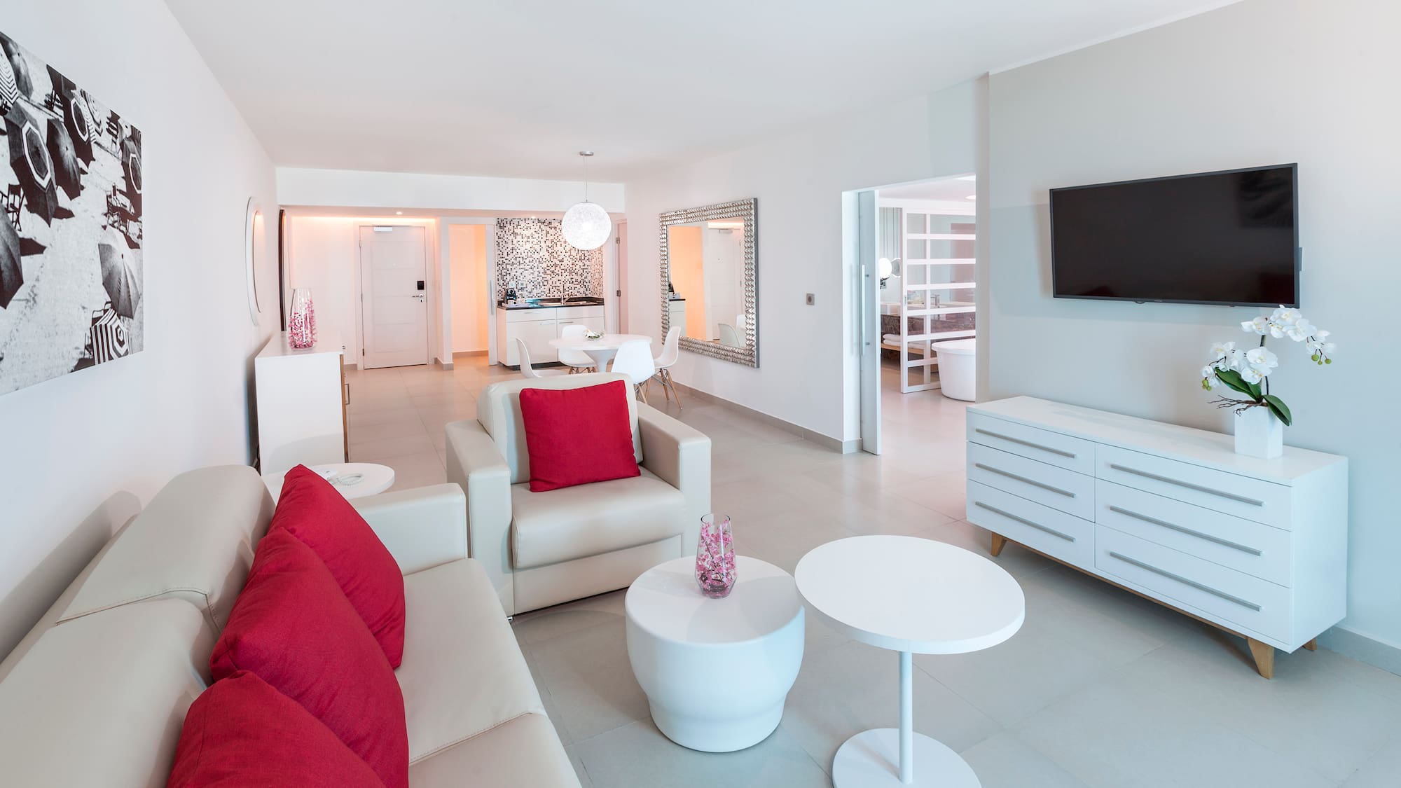 a living room with a television and a couch