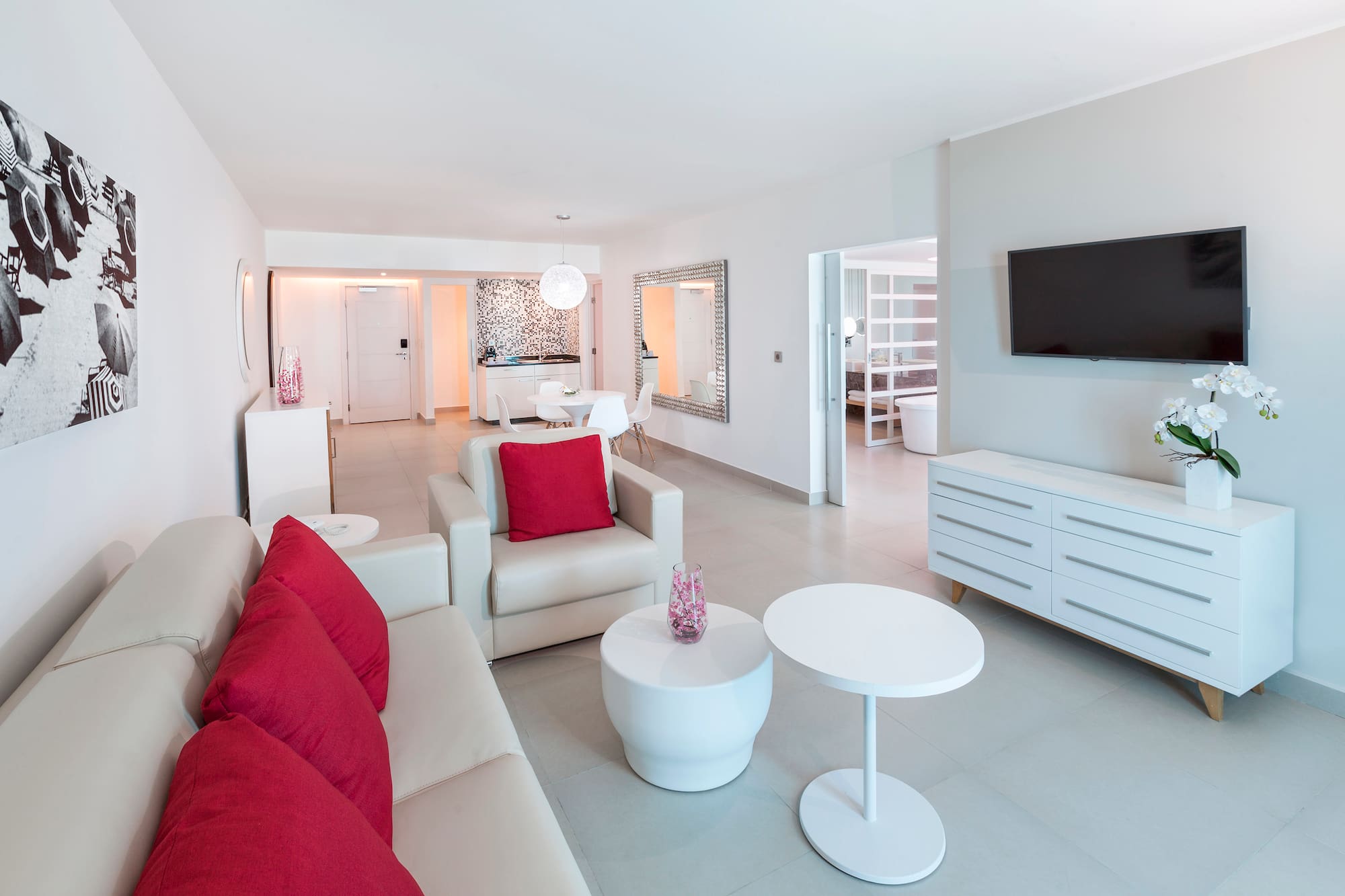 a living room with a television and a couch