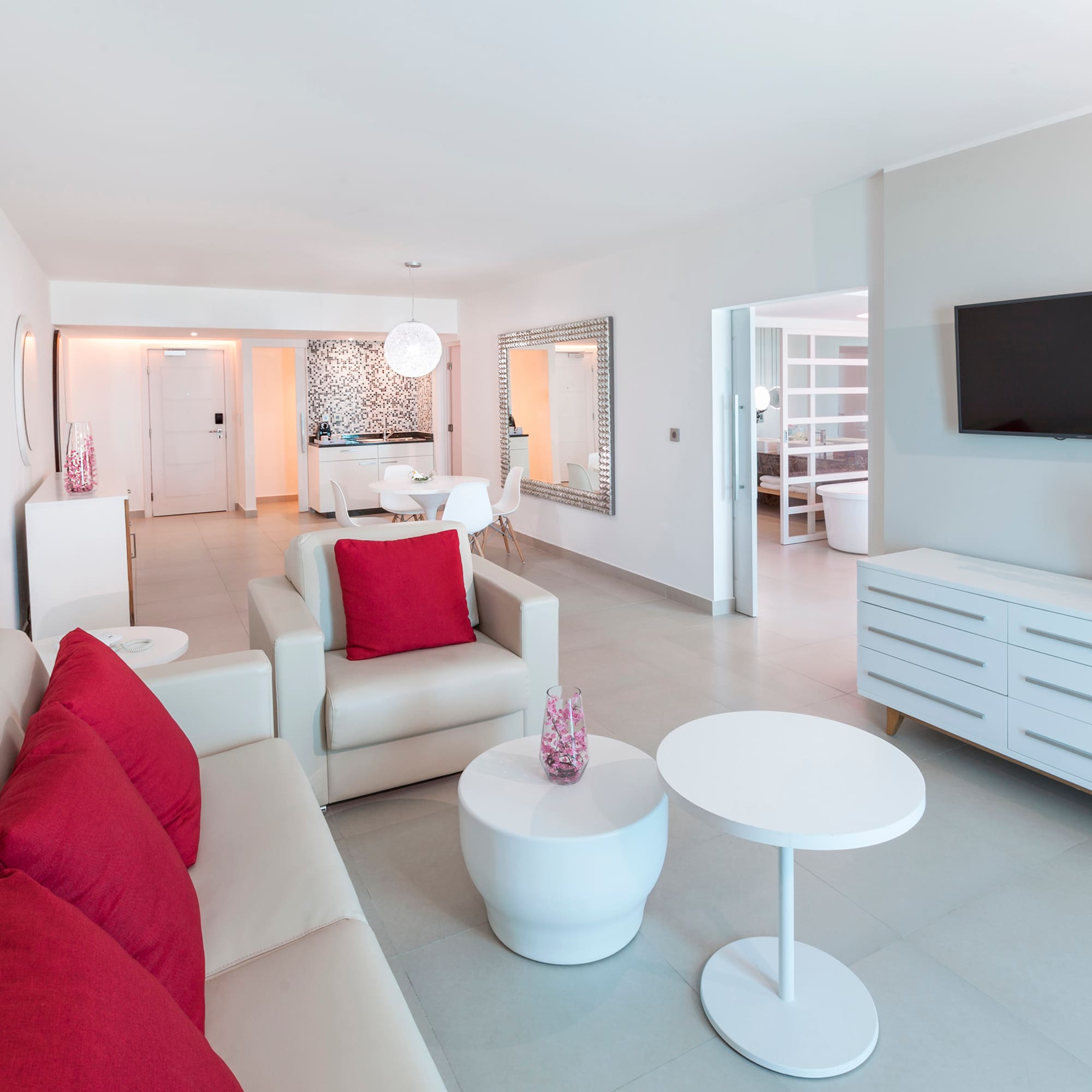 a living room with a television and a couch