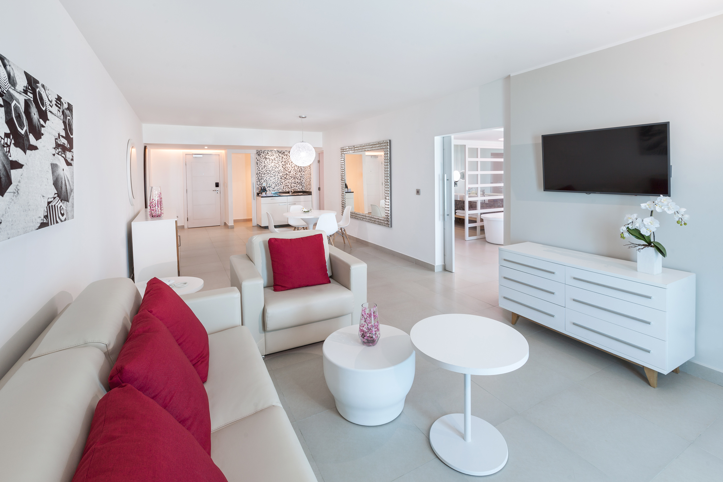 a living room with a television and a couch