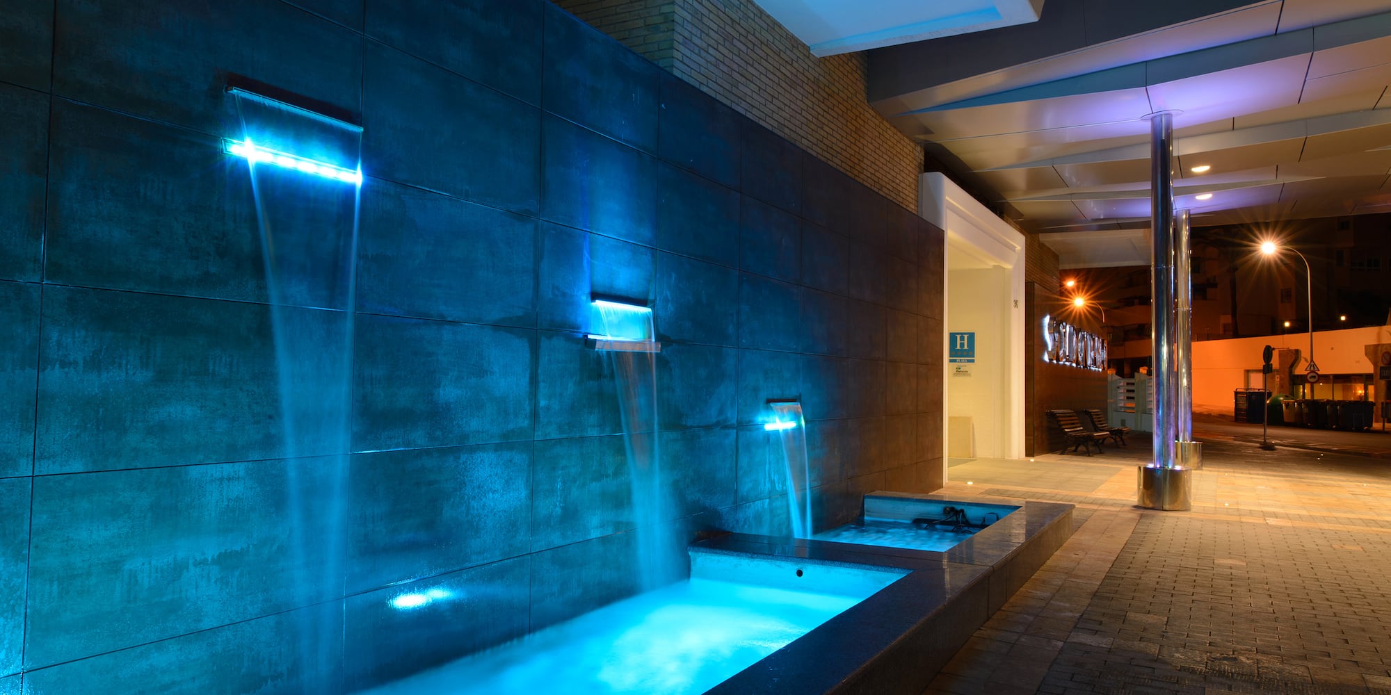 a water fountain with blue lights