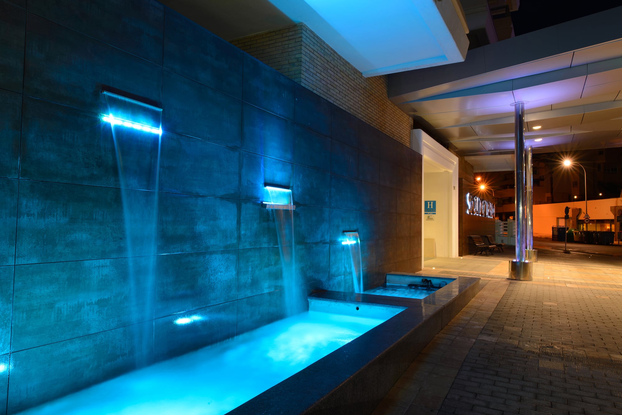 a water fountain with blue lights