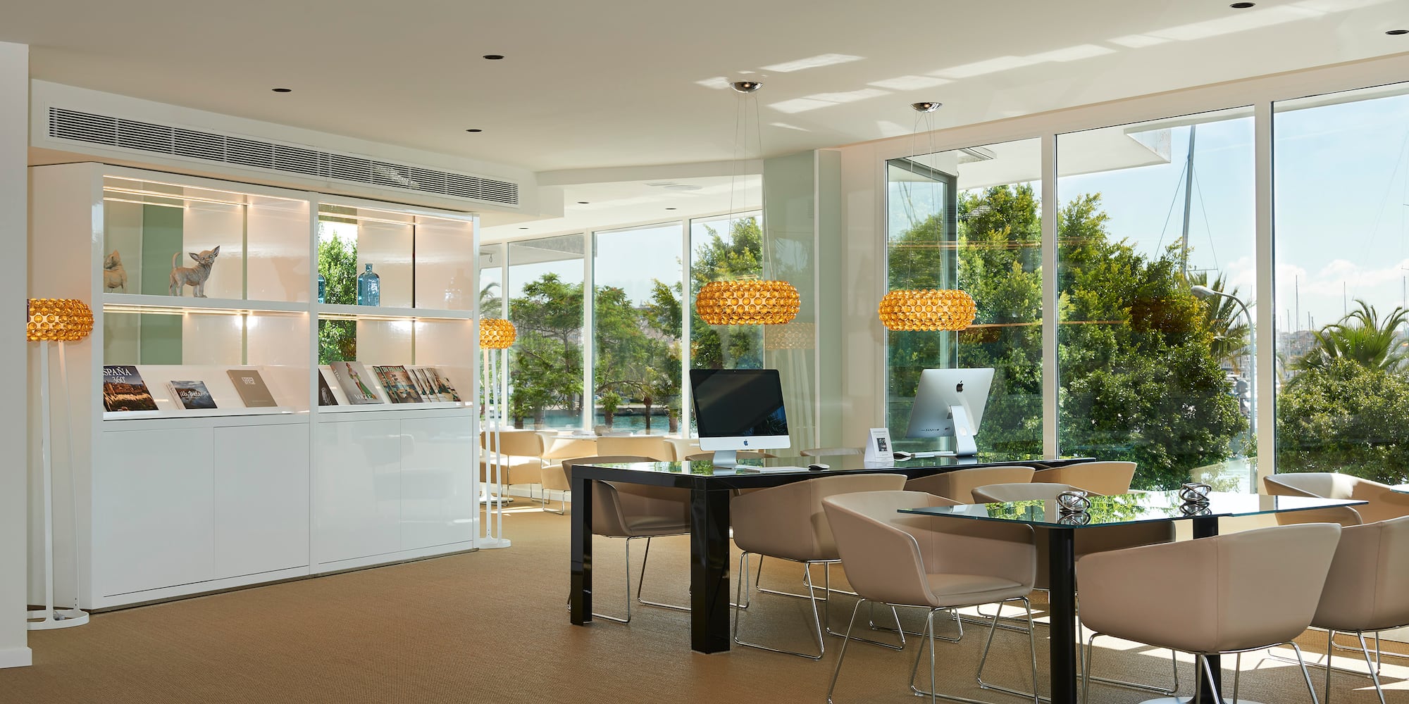 a room with a computer and a table