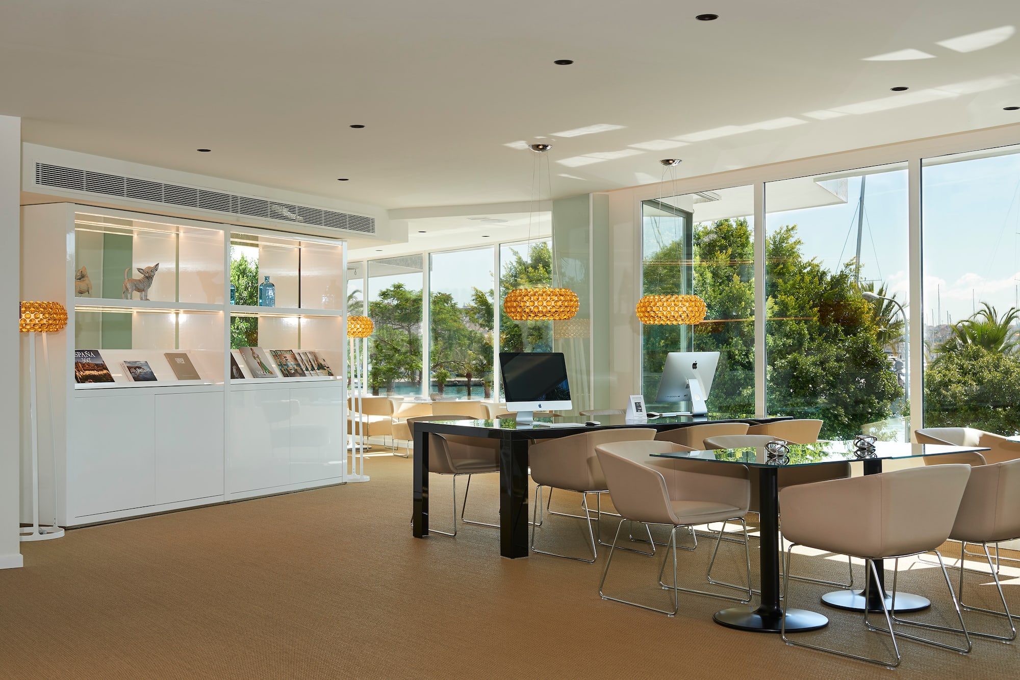 a room with a computer and a table