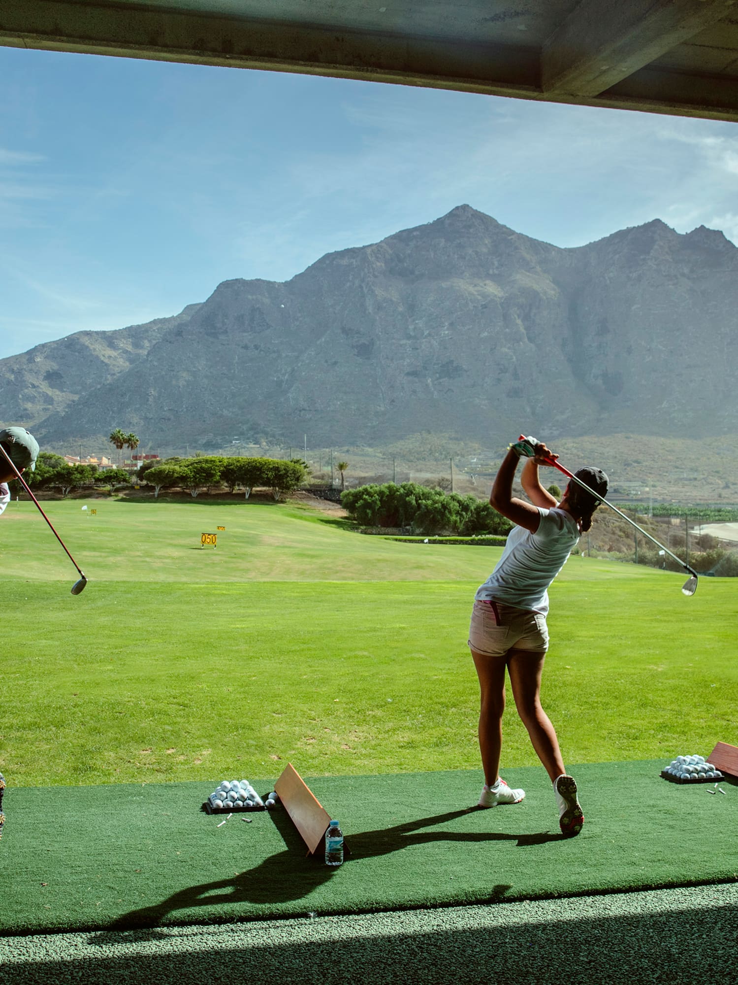 a group of people playing golf