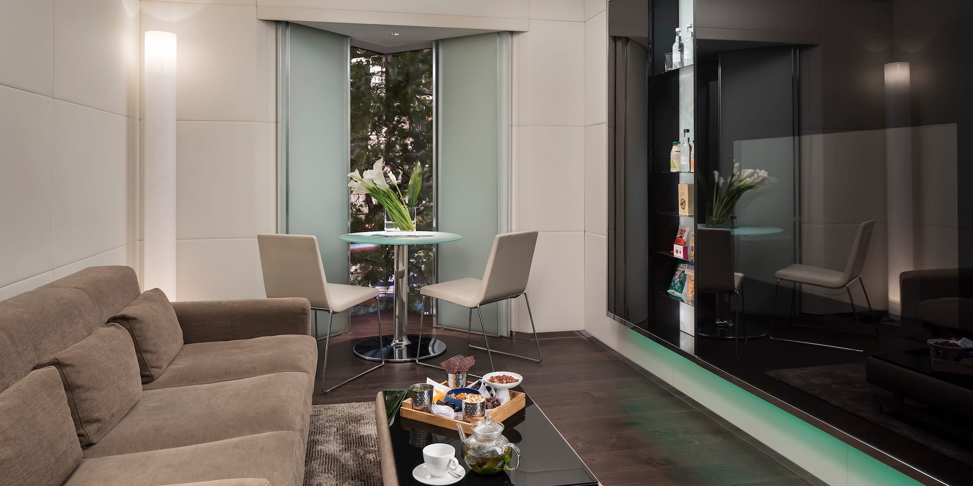 a living room with a couch and a table