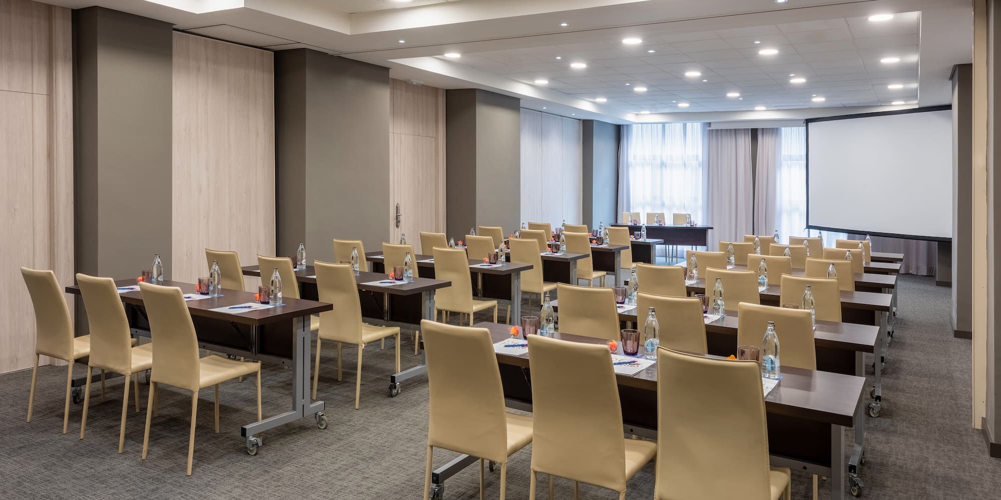 a room with tables and chairs