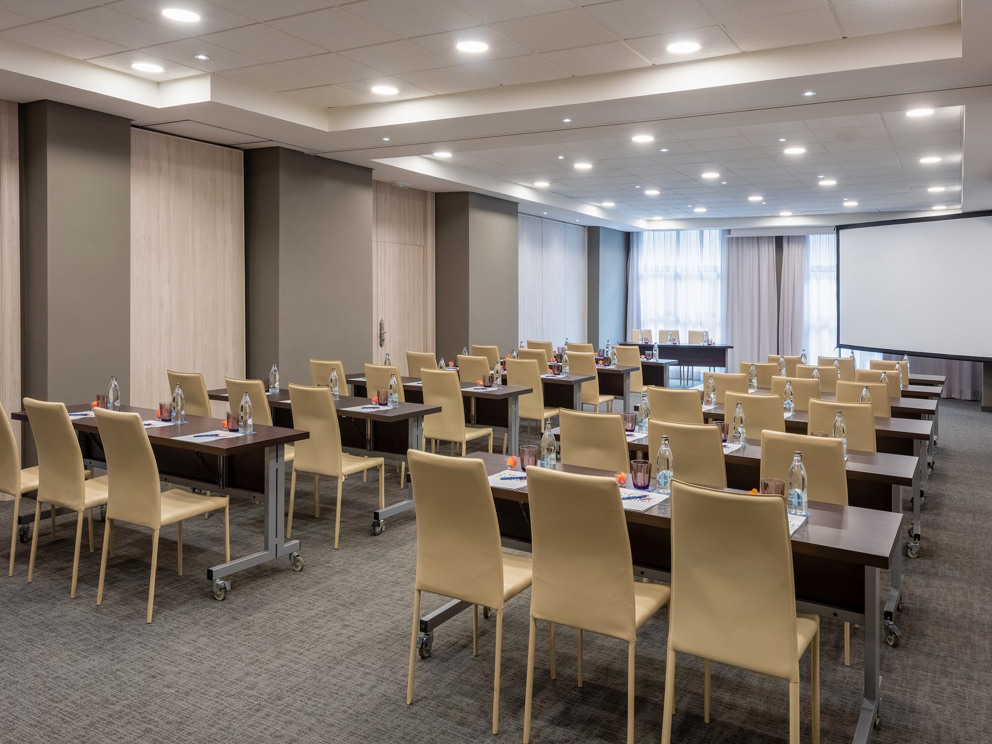 a room with tables and chairs