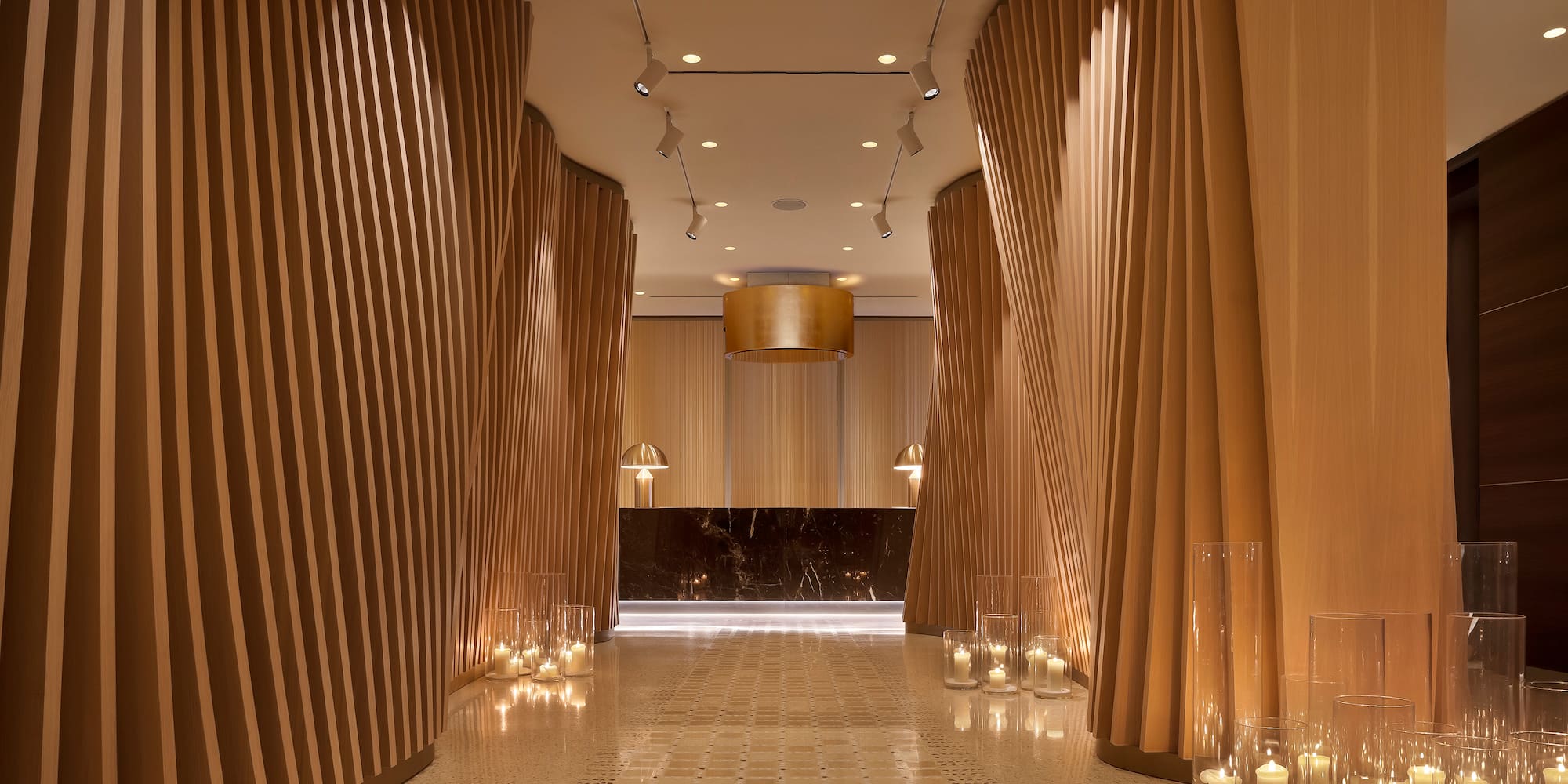 a hallway with candles and lights