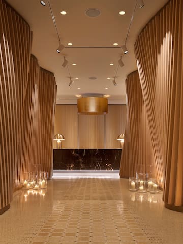a hallway with candles and lights