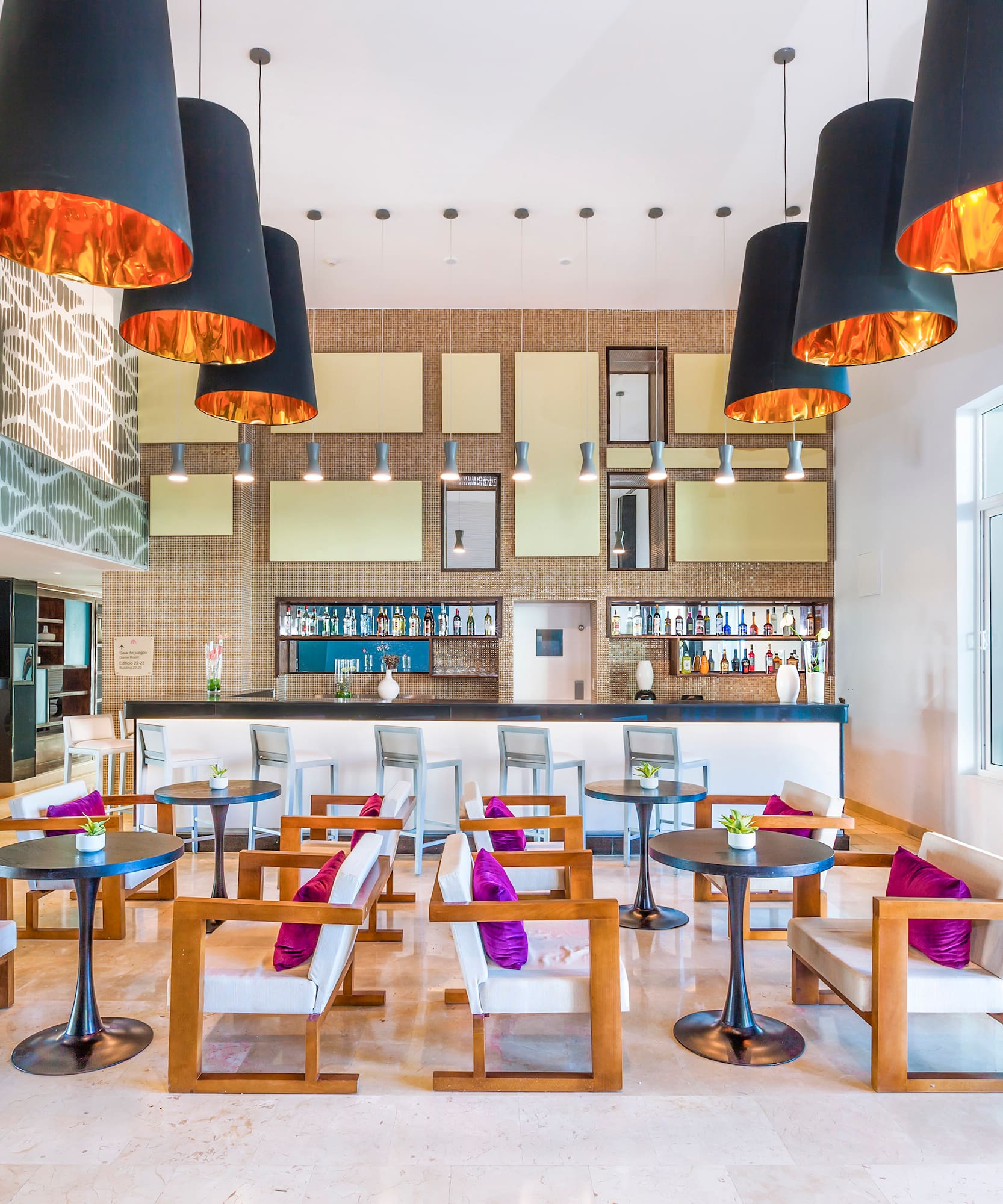 a room with tables and chairs