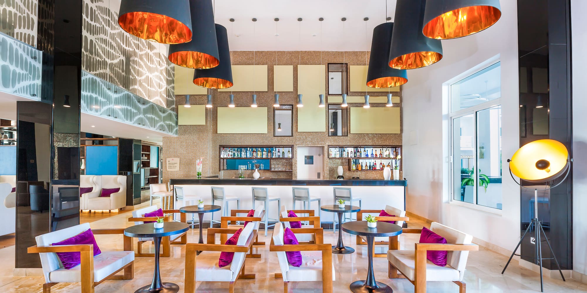 a room with tables and chairs