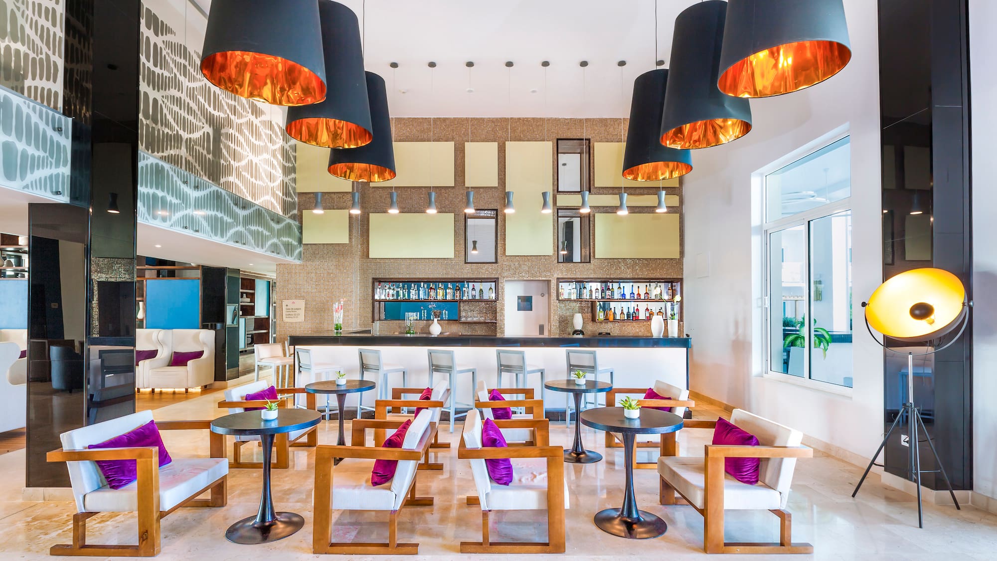 a room with tables and chairs