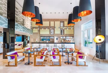 a room with tables and chairs