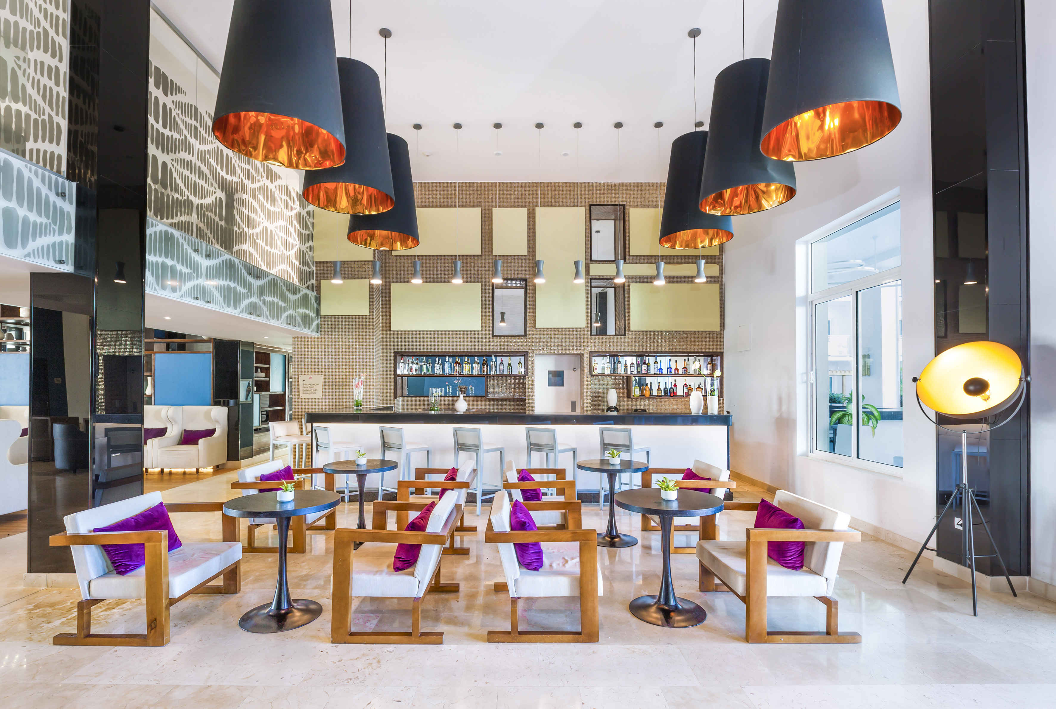 a room with tables and chairs