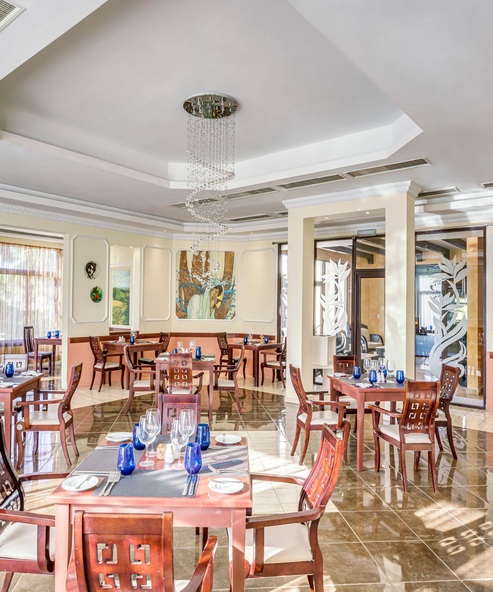 a room with tables and chairs