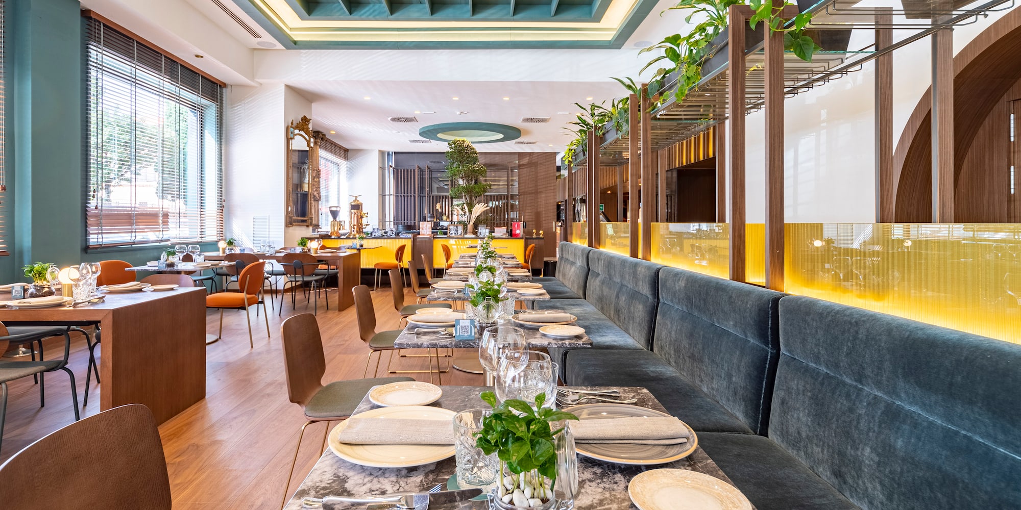 a restaurant with tables and chairs