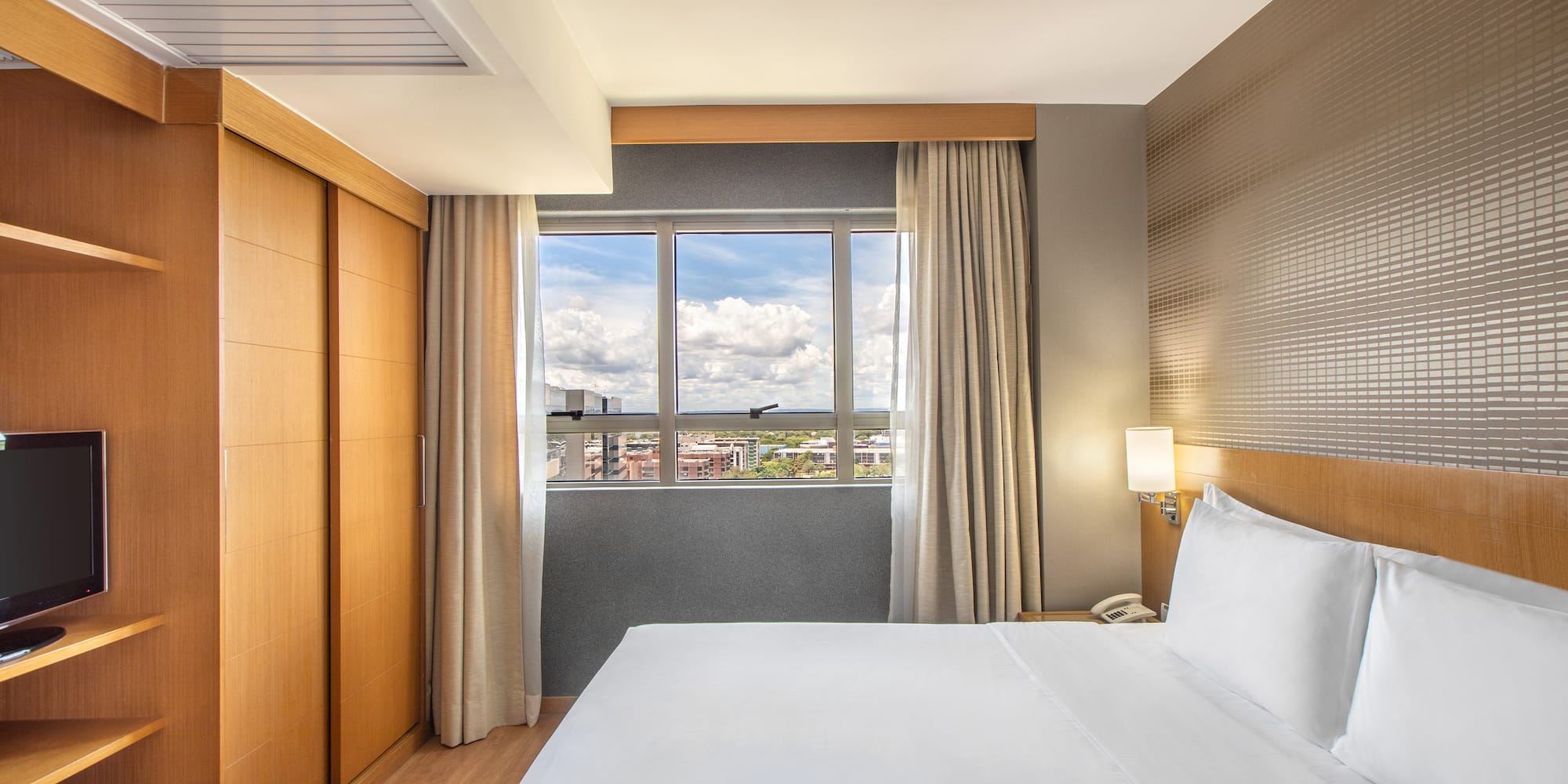 a room with a bed and closets