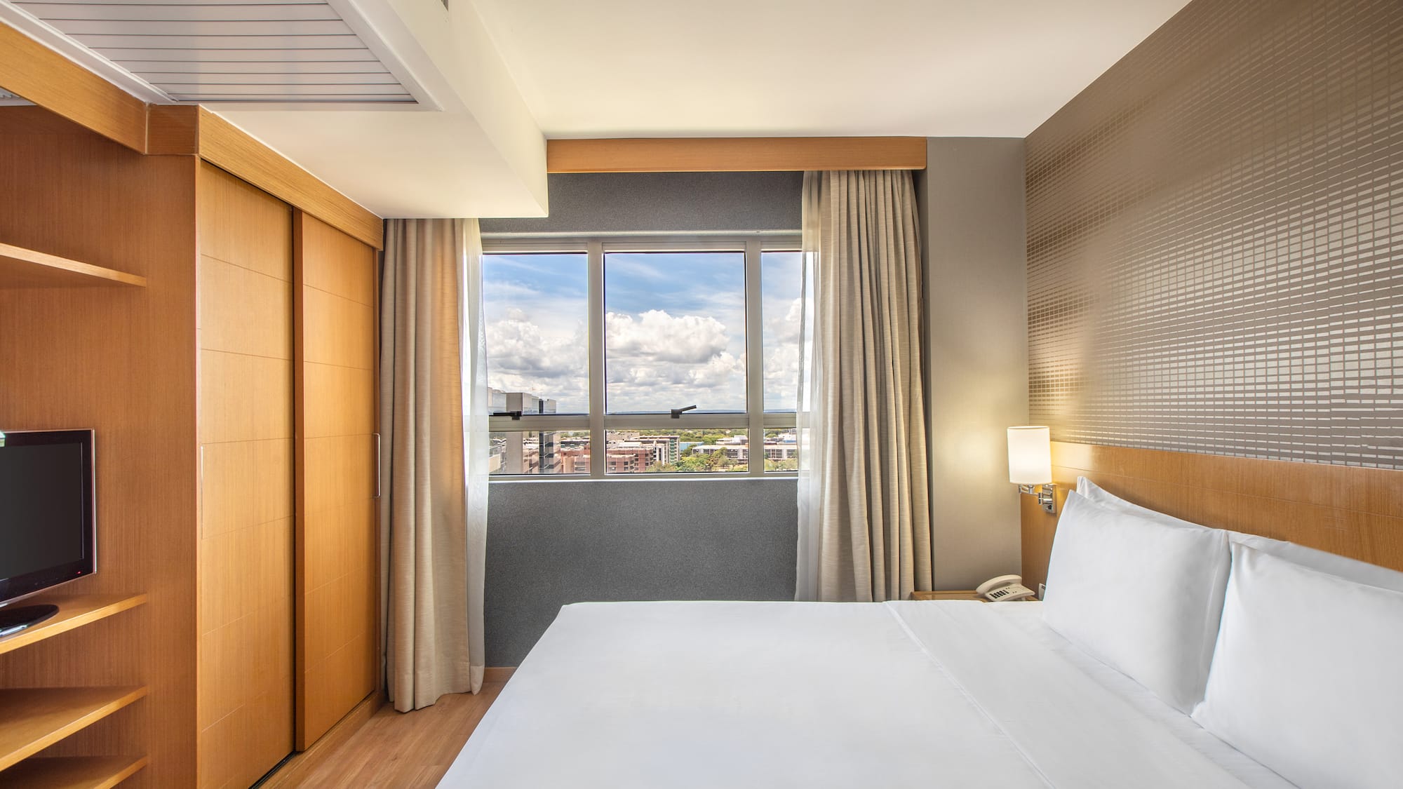 a room with a bed and closets