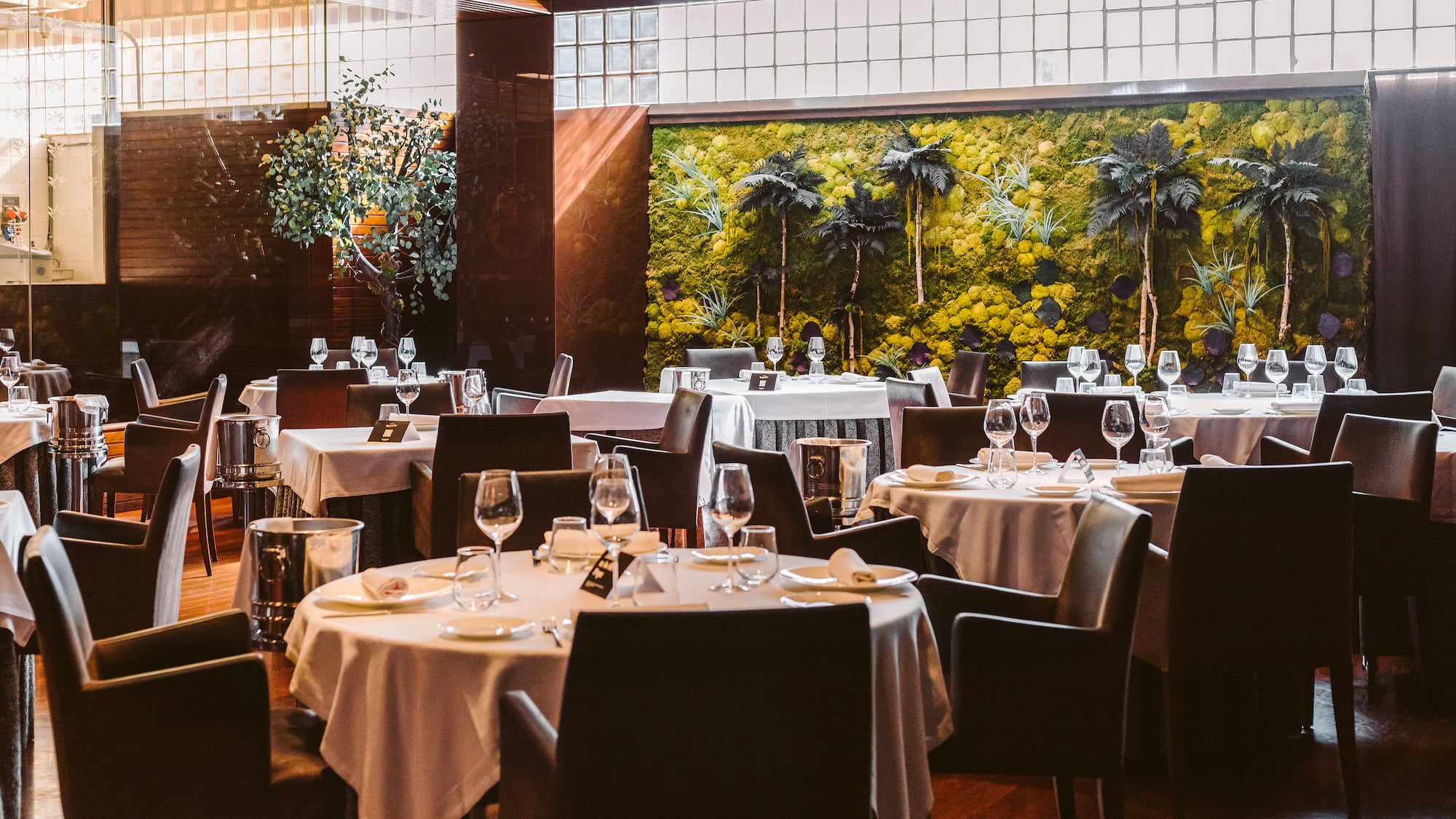 a room with tables and chairs