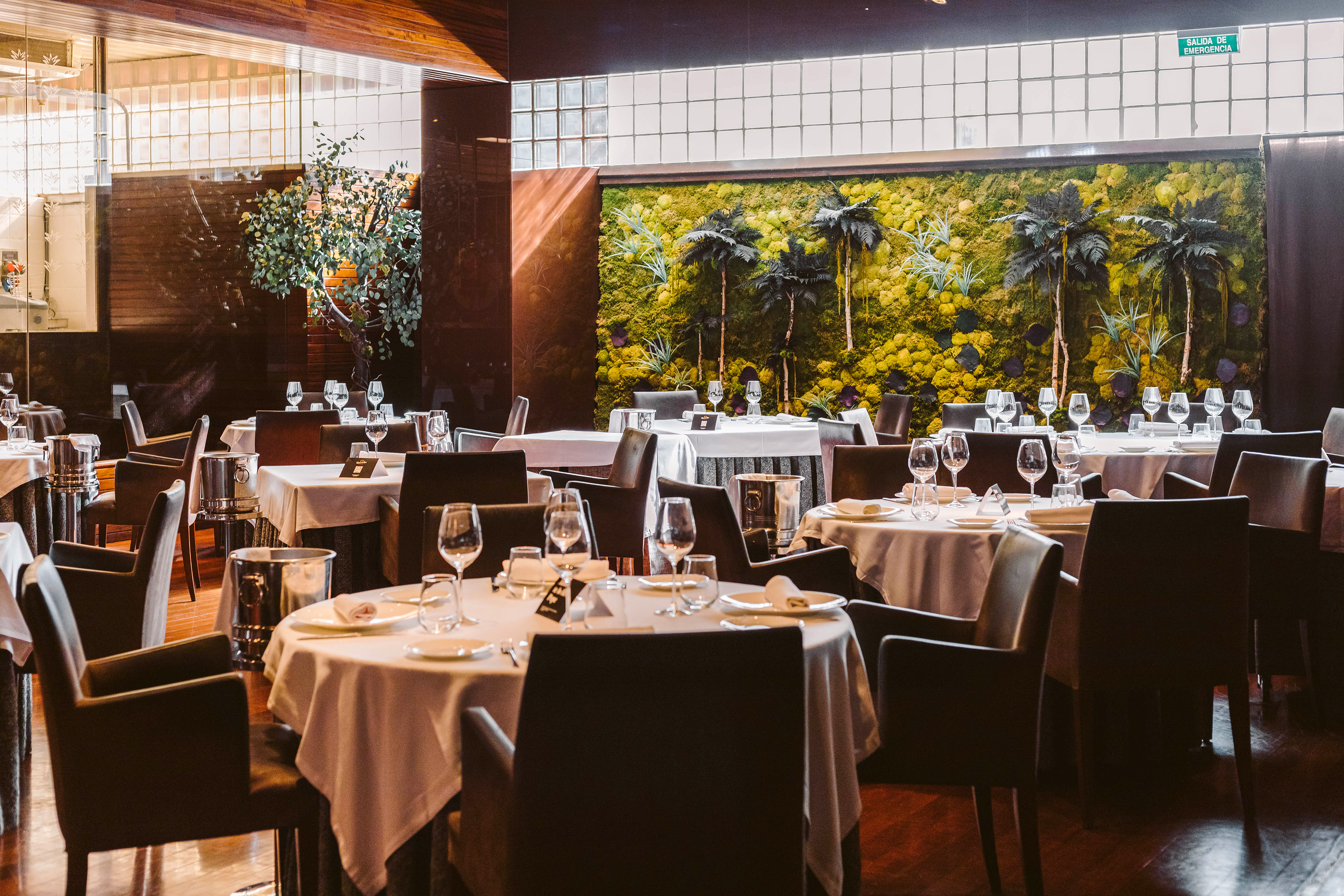 a room with tables and chairs