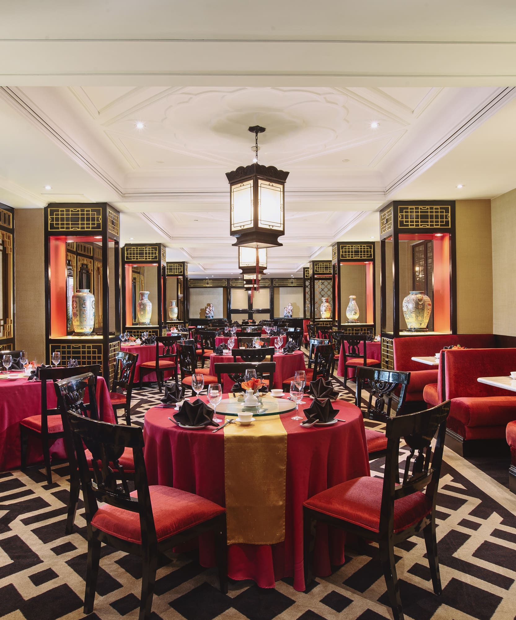 a restaurant with tables and chairs