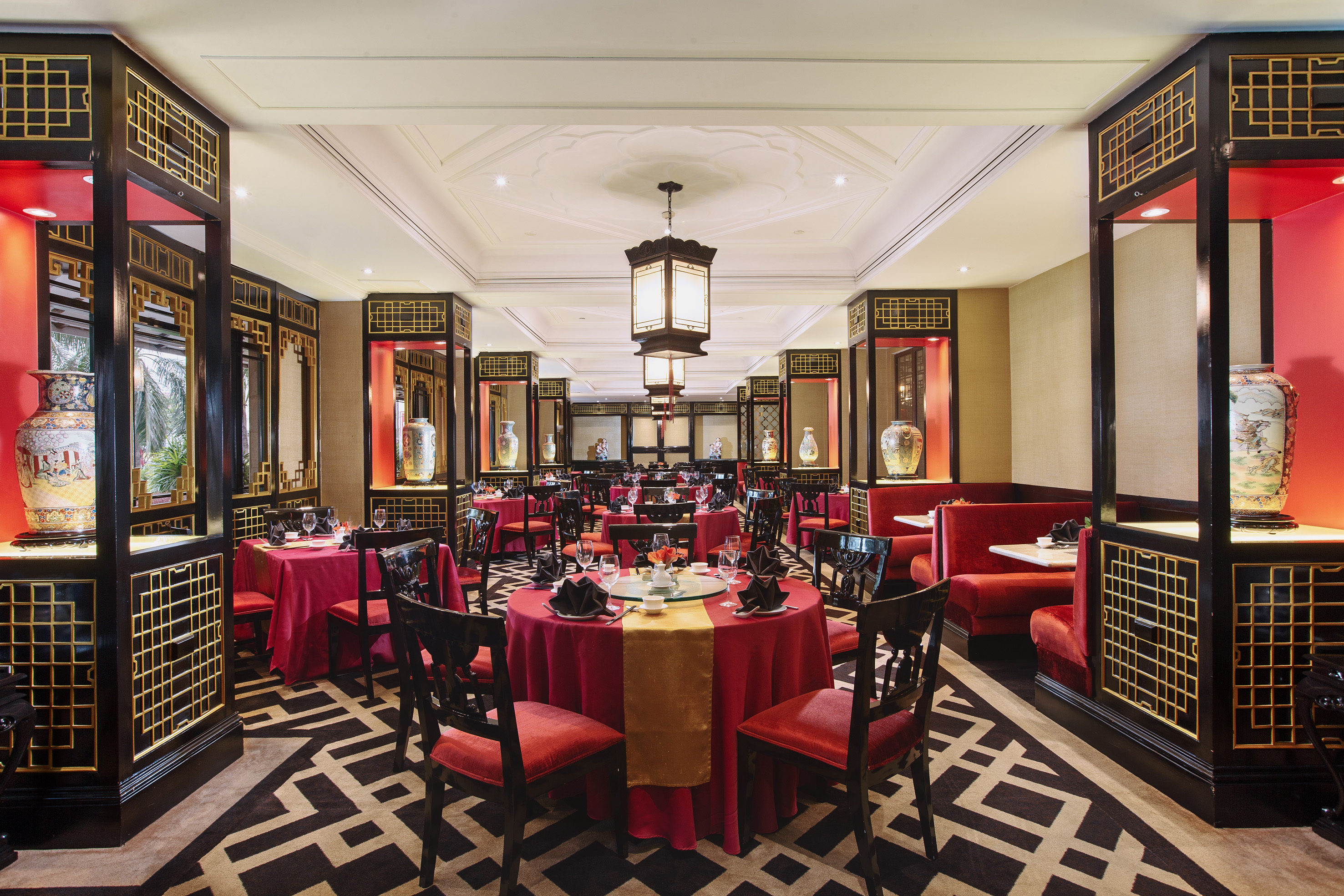 a restaurant with tables and chairs