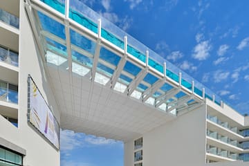 a white building with glass roof