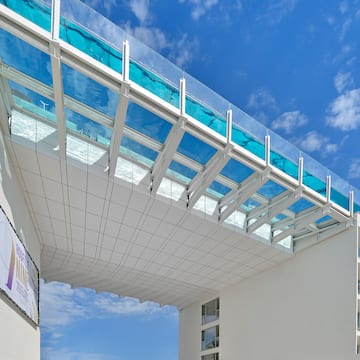 a white building with glass roof