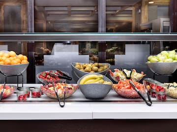 a buffet table full of fruit