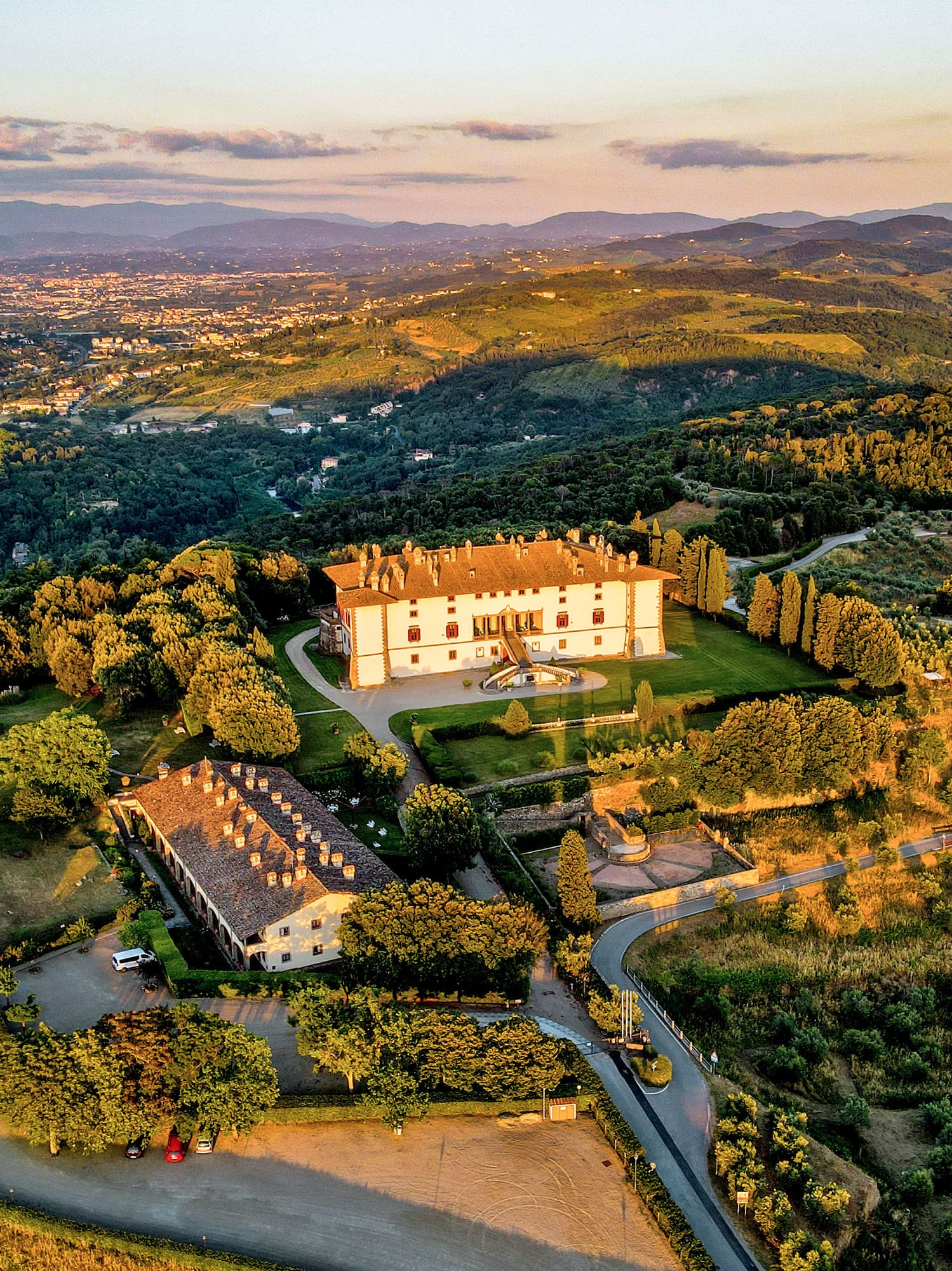 a large house surrounded by trees