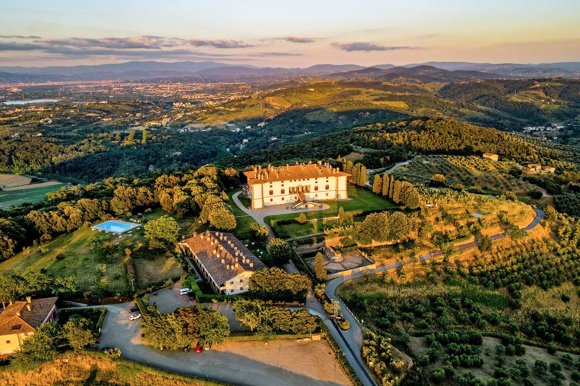 a large house surrounded by trees
