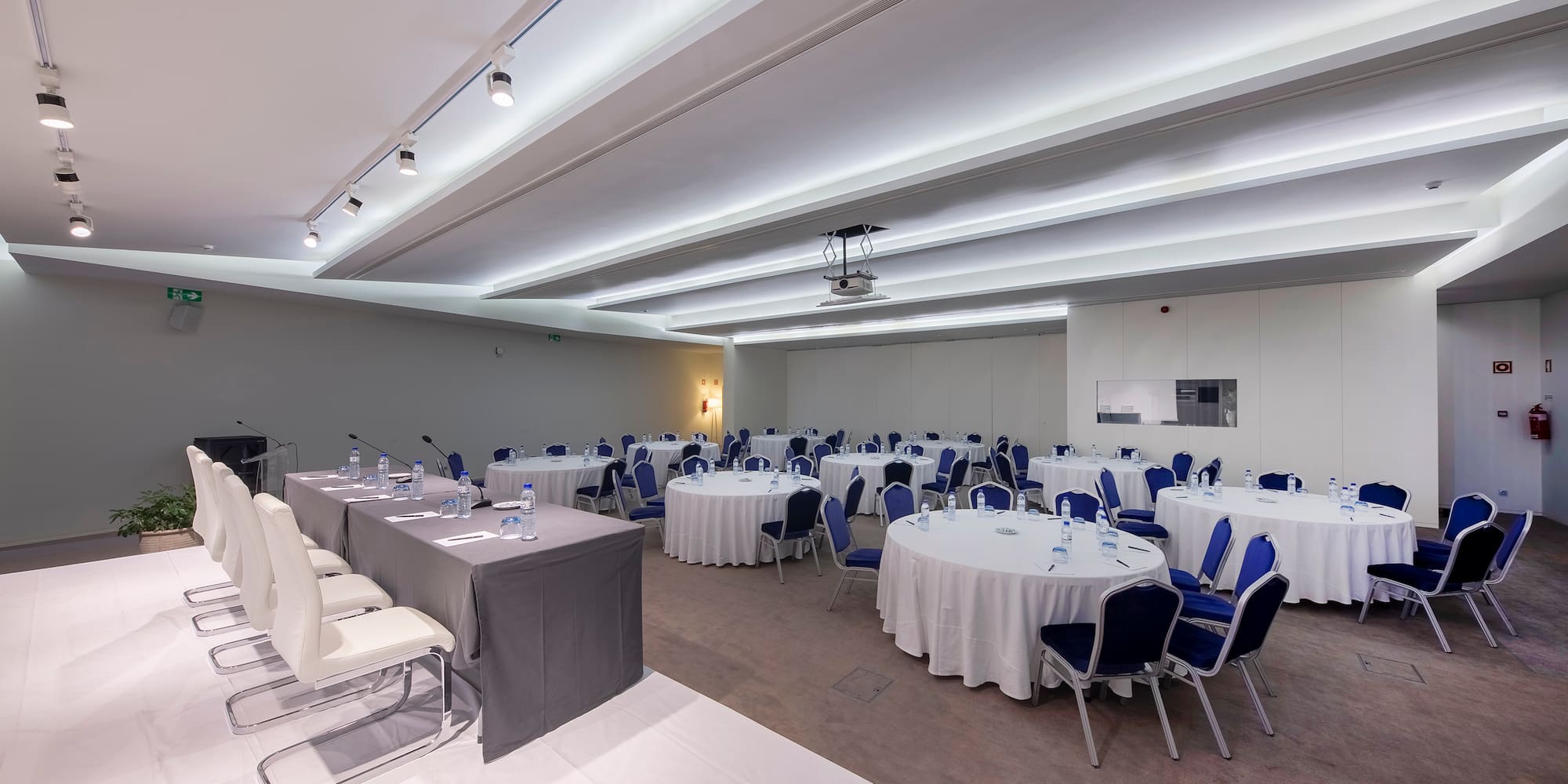 a room with tables and chairs