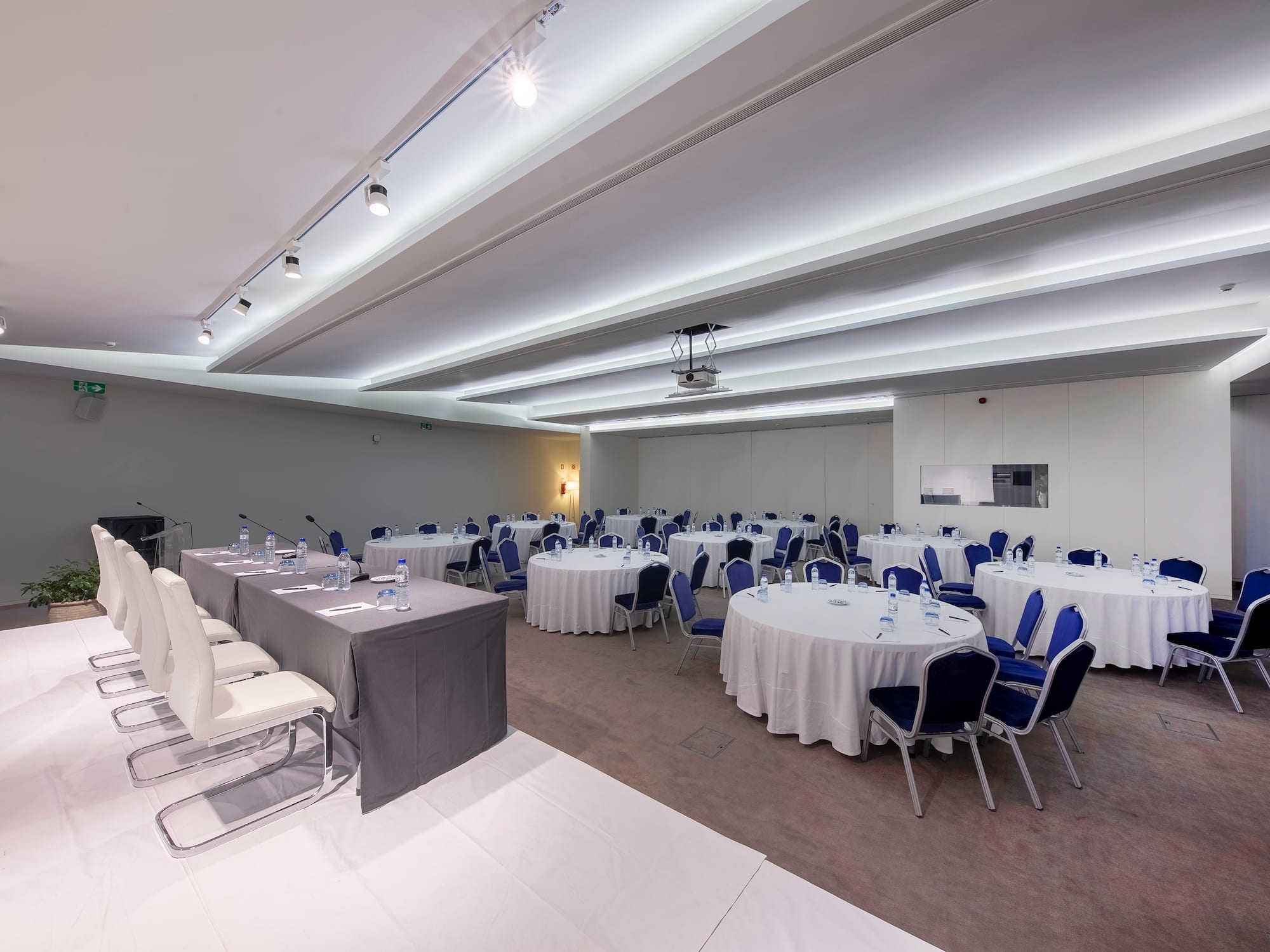 a room with tables and chairs