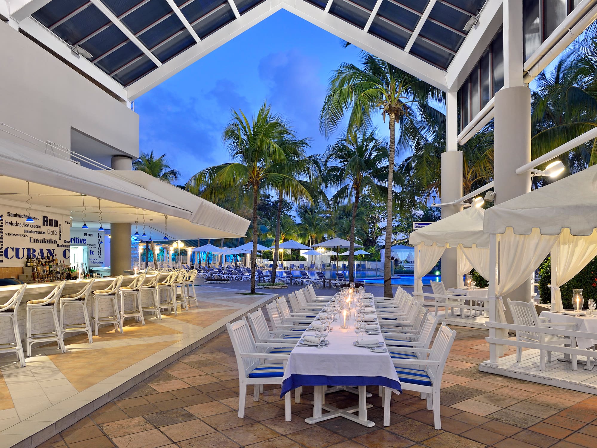 a restaurant with tables and chairs