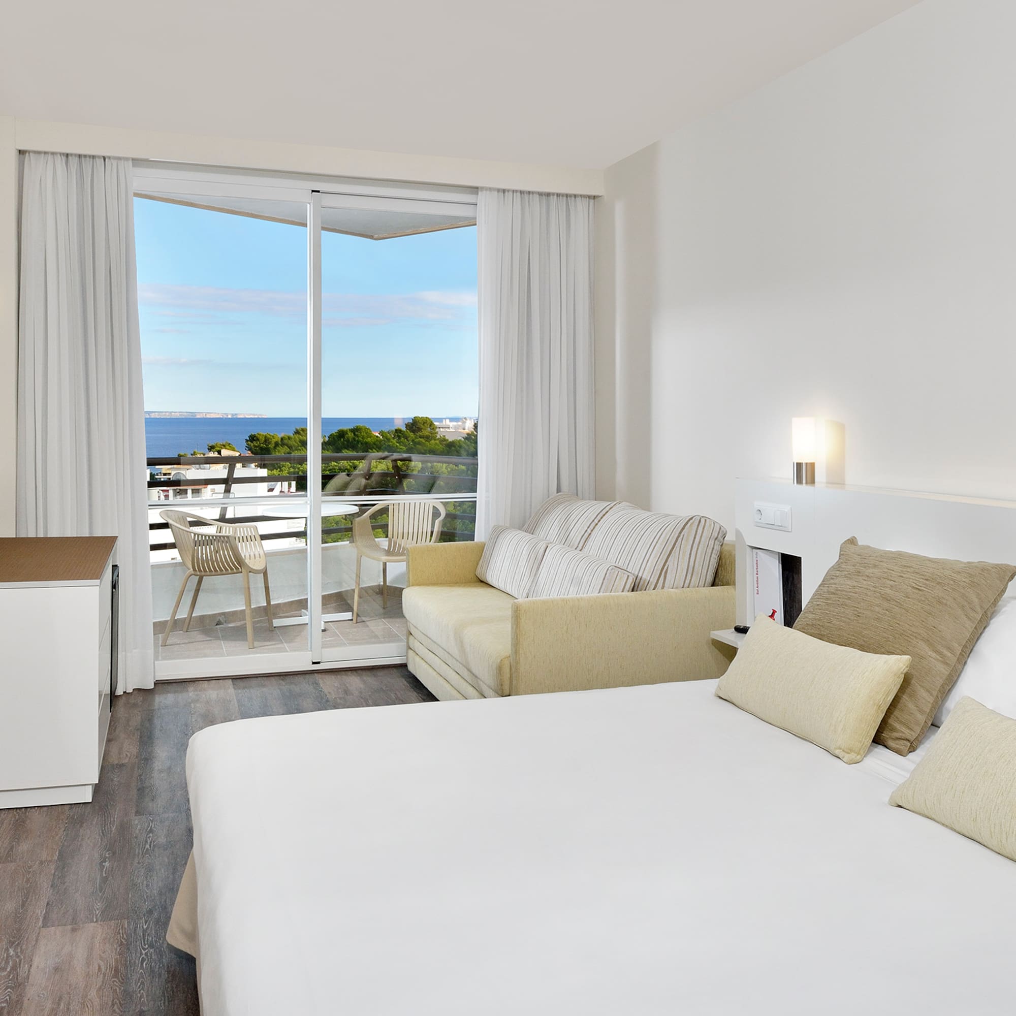 a room with a bed and a couch