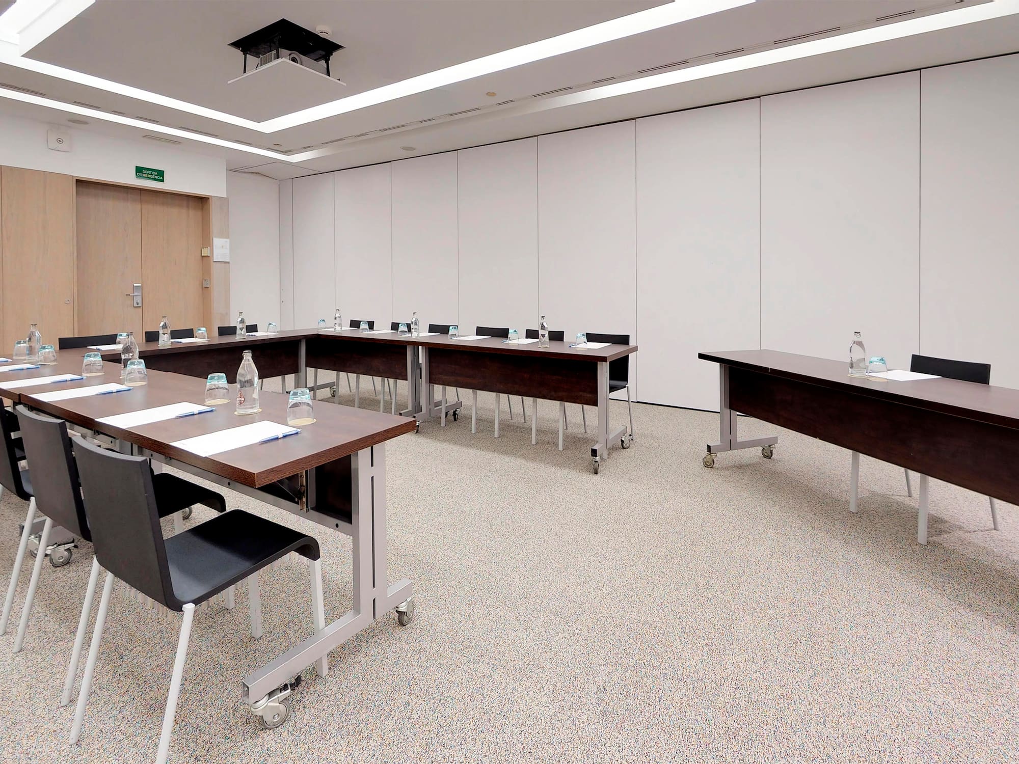 a room with tables and chairs