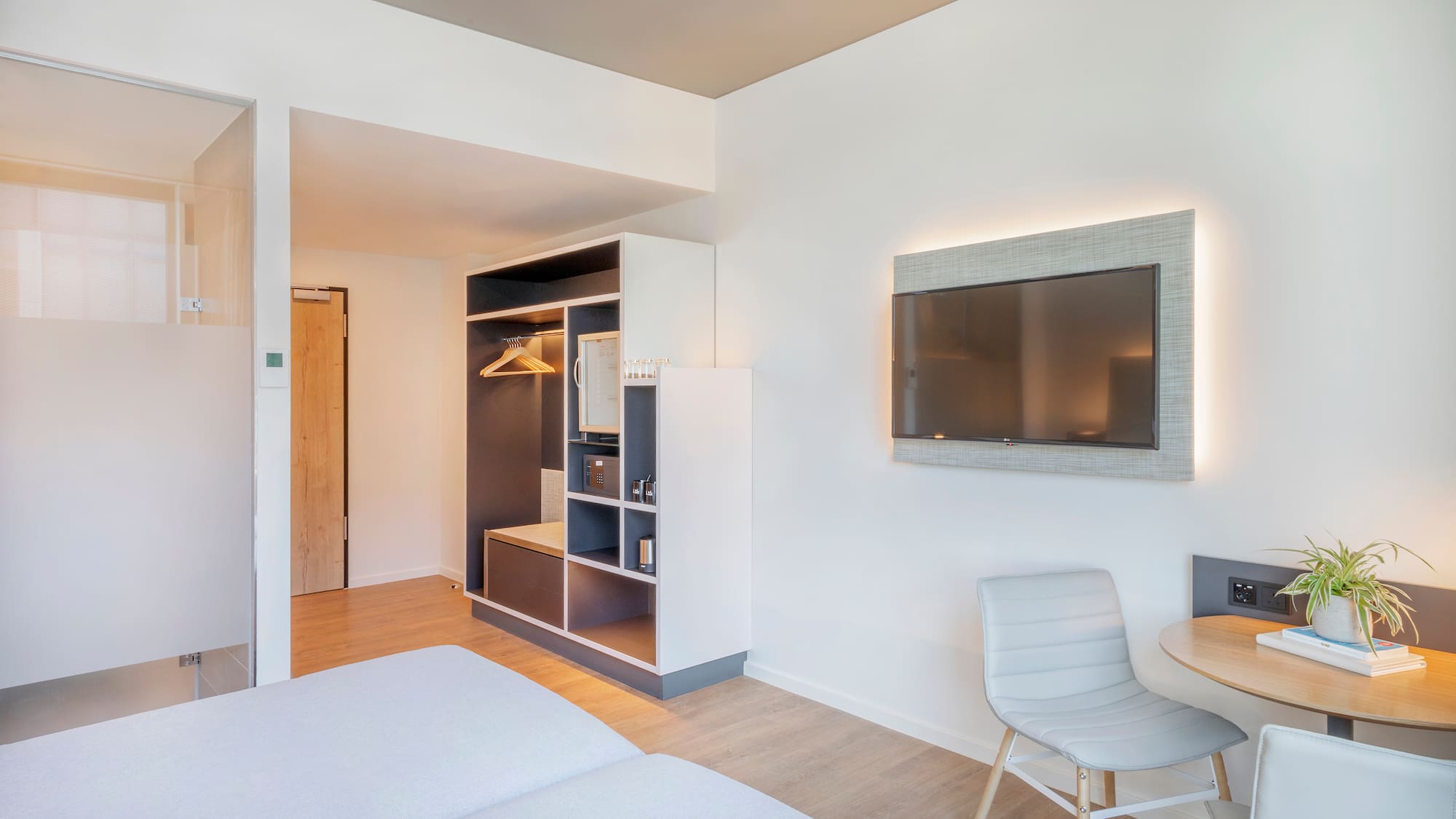 a room with a tv and a table